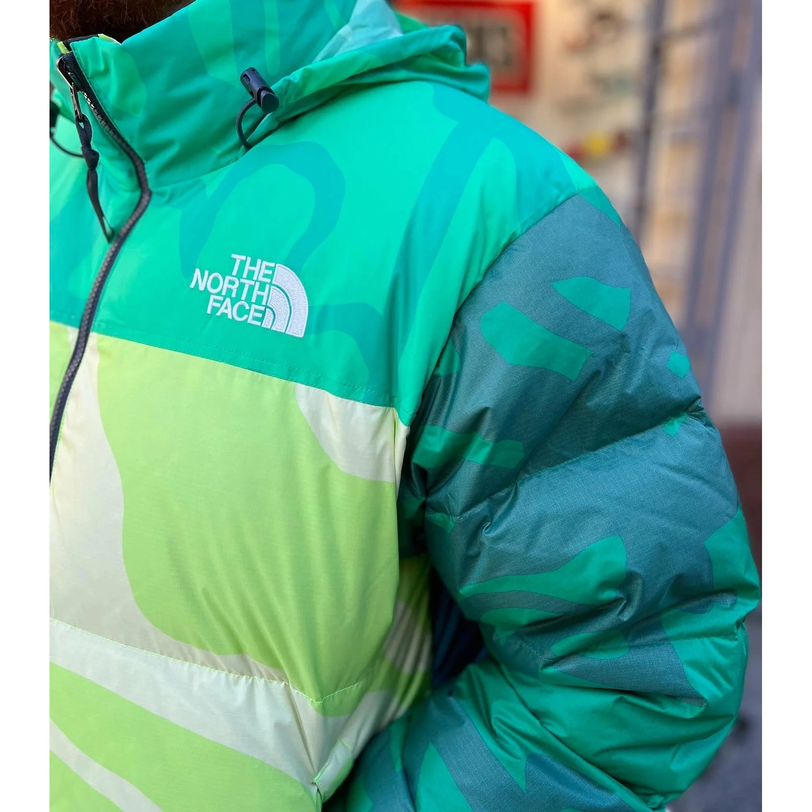 KAWS x The North Face Retro 1996 Nuptse Jacket Safety Green - Image 4